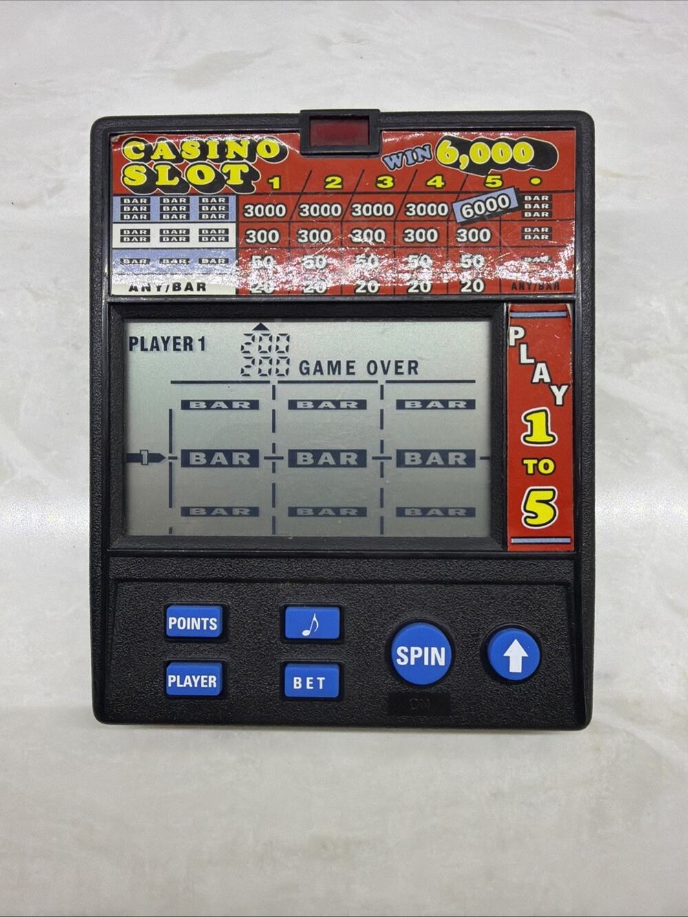 Vintage Radica Casino Slot 6,000 (Model 1470) Electronic Handheld Game TESTED